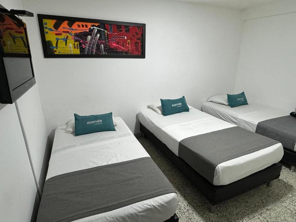 Postel nebo postele na pokoji v ubytování Hotel JC 43