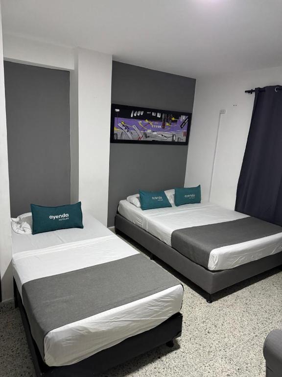 Postel nebo postele na pokoji v ubytování Hotel JC 43