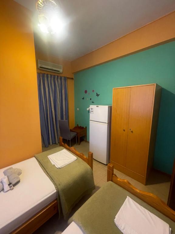 Postel nebo postele na pokoji v ubytování Pislis Rooms