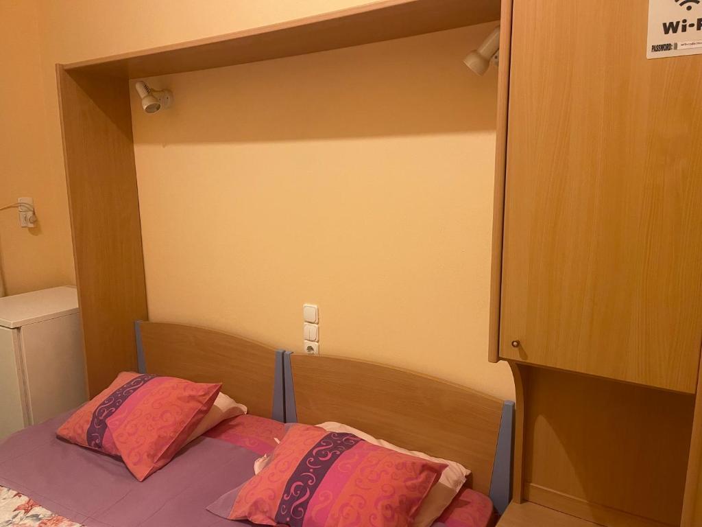 Postel nebo postele na pokoji v ubytování Pislis Rooms