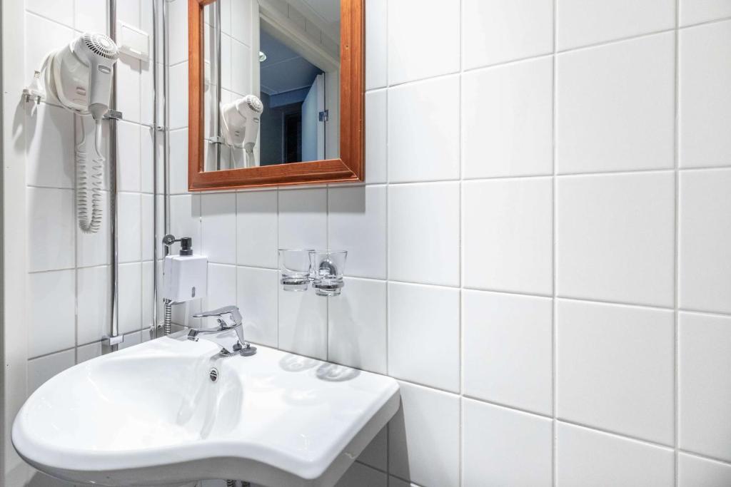 Koupelna v ubytování Scandic Kallio