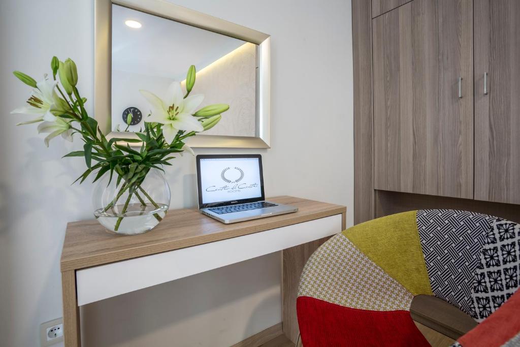 TV a/nebo společenská místnost v ubytování Centro di Centri Rooms