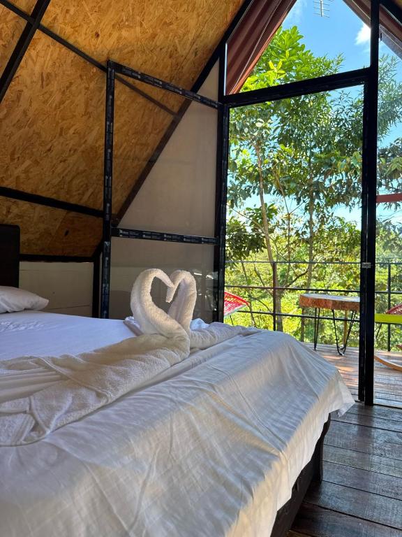 Voodi või voodid majutusasutuse Glamping RanchoEmilio toas
