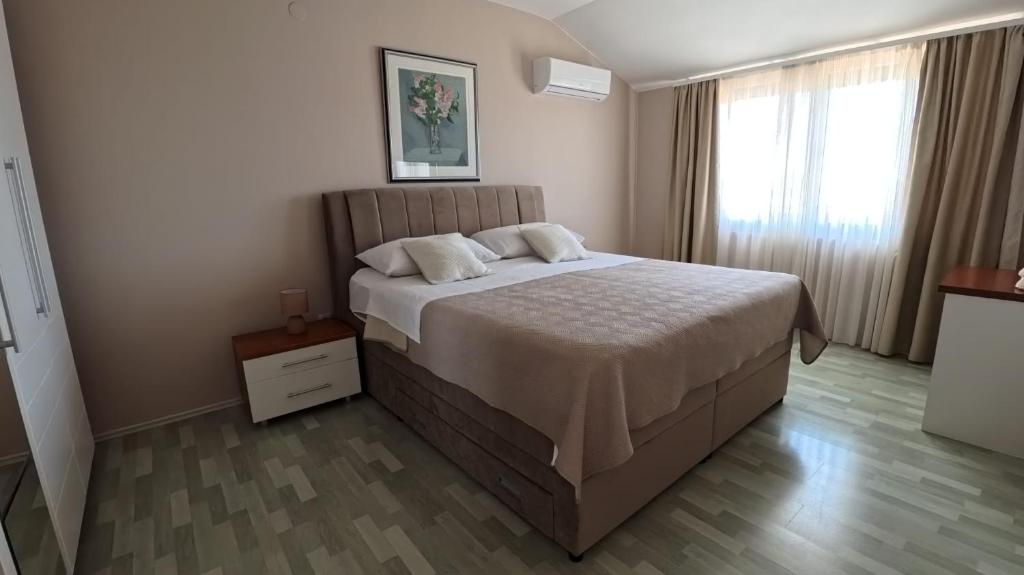 Postel nebo postele na pokoji v ubytování Villa Tea