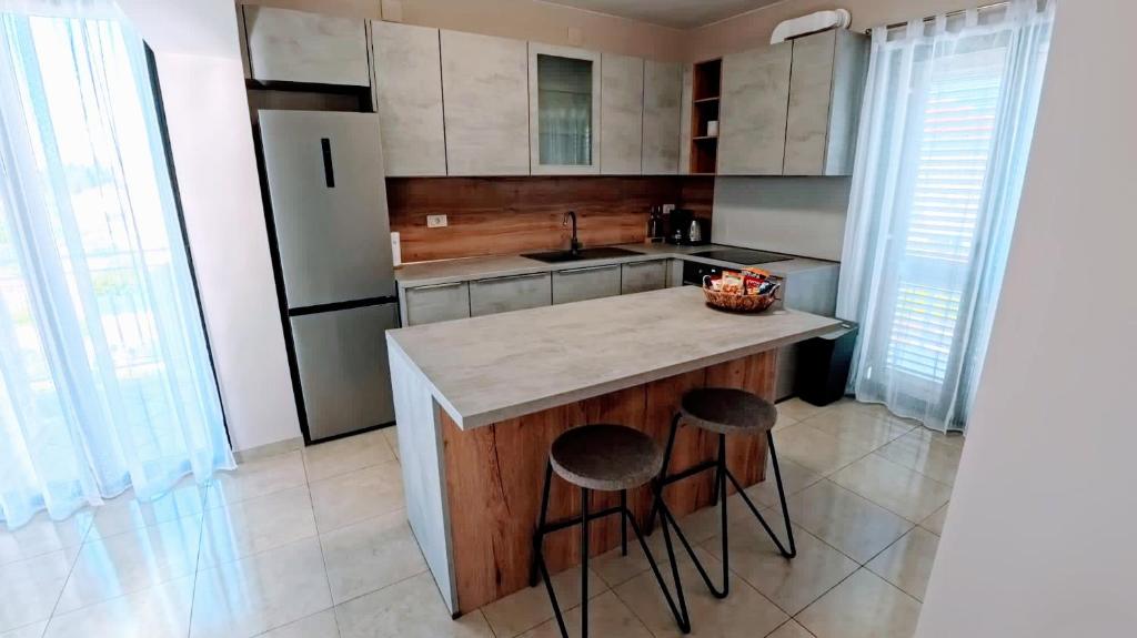 Kuchyň nebo kuchyňský kout v ubytování Villa Tea