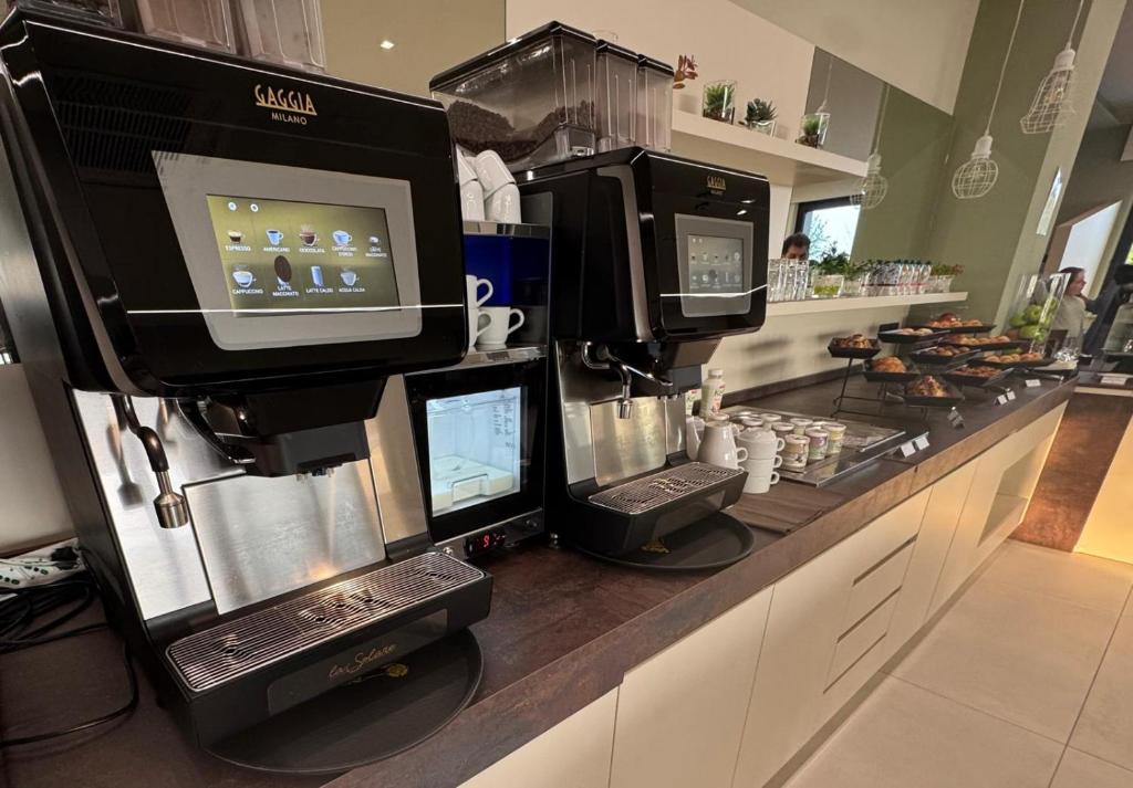 Kuchyň nebo kuchyňský kout v ubytování Ile Hotel