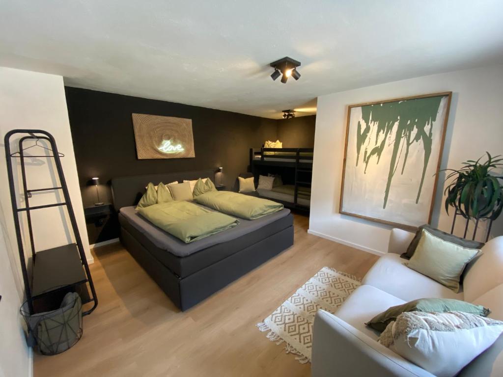 Postel nebo postele na pokoji v ubytování Tini House