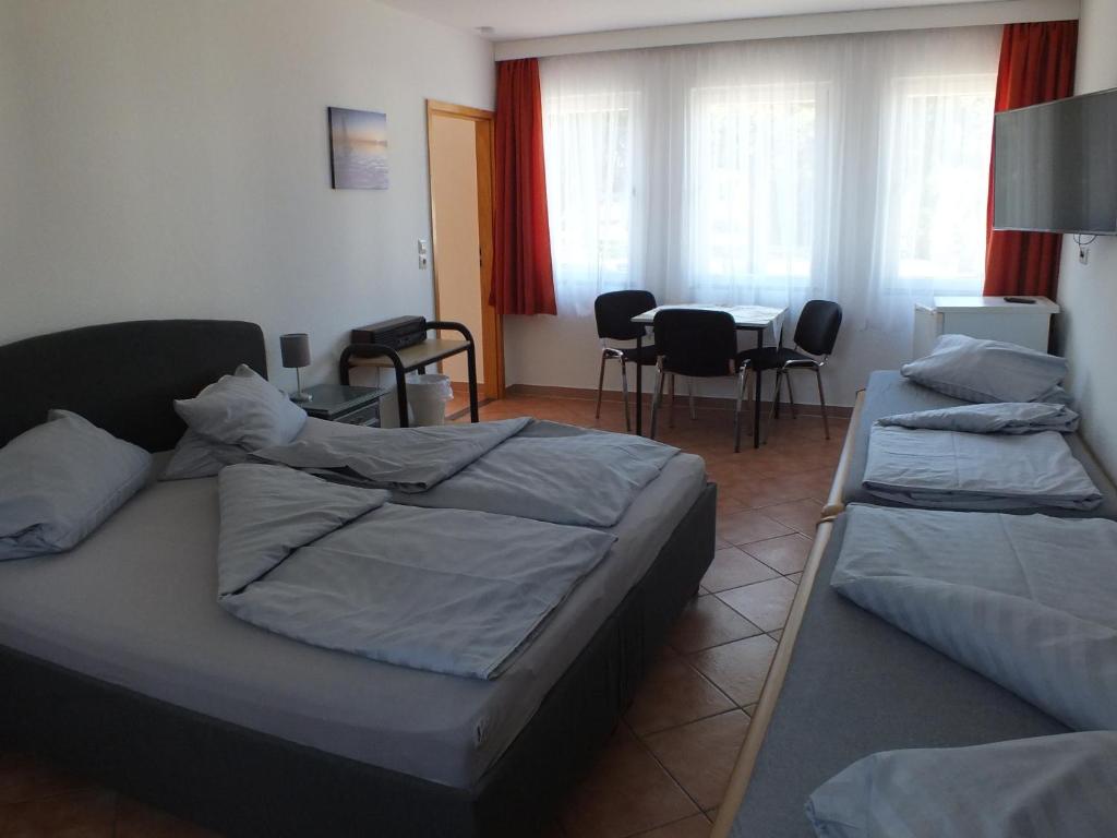Ένα ή περισσότερα κρεβάτια σε δωμάτιο στο Bungalow 1