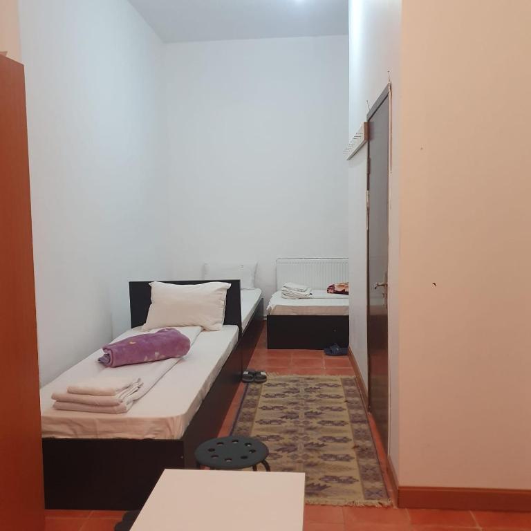 Postel nebo postele na pokoji v ubytování Cazare - Accommodation