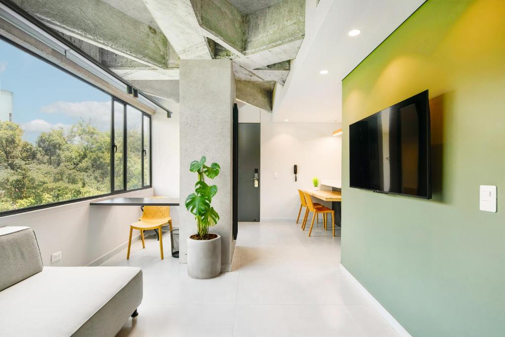 TV a/nebo společenská místnost v ubytování Firenze Lofts