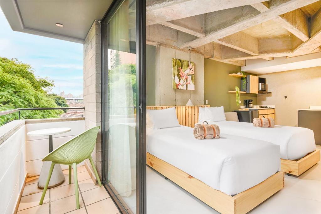 Postel nebo postele na pokoji v ubytování Firenze Lofts