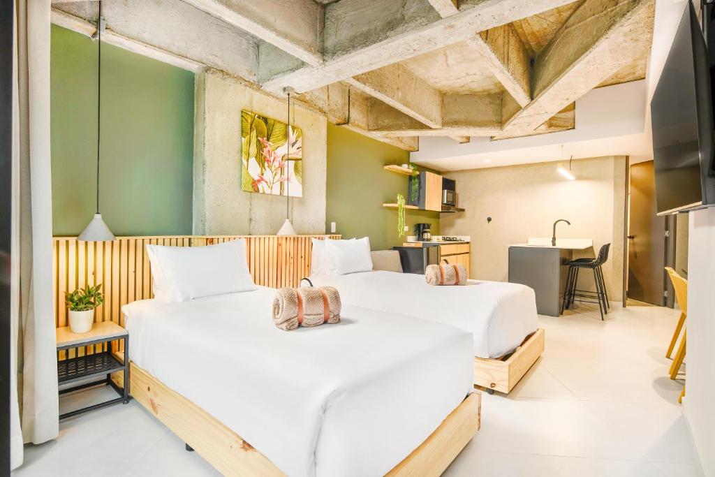 Postel nebo postele na pokoji v ubytování Firenze Lofts