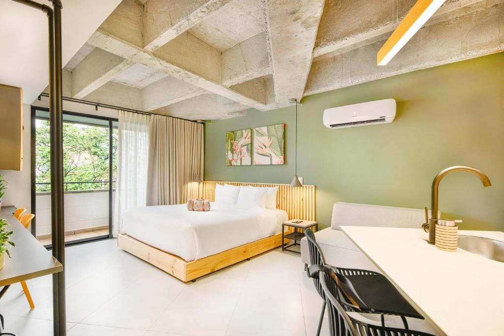 Postel nebo postele na pokoji v ubytování Firenze Lofts