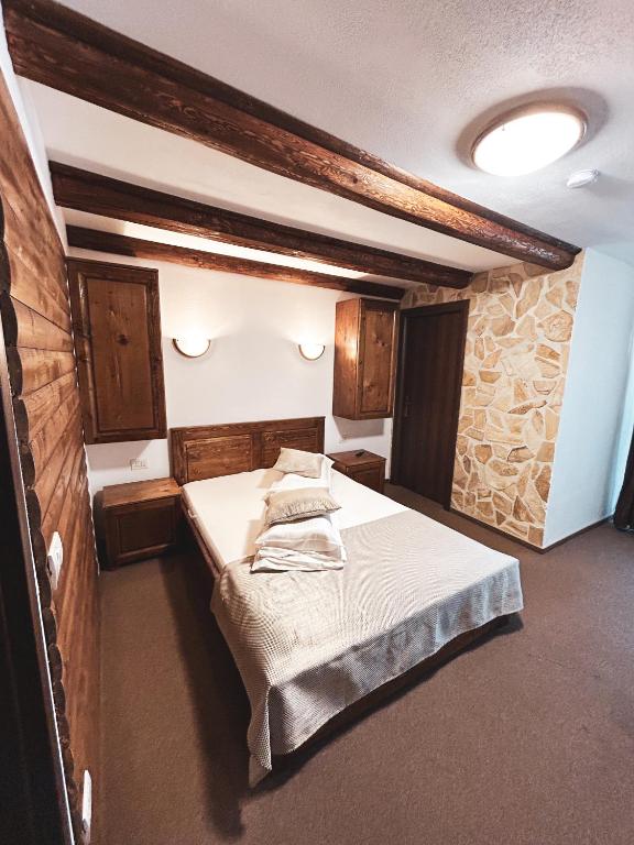 Postel nebo postele na pokoji v ubytování Pensiunea Bella Vista