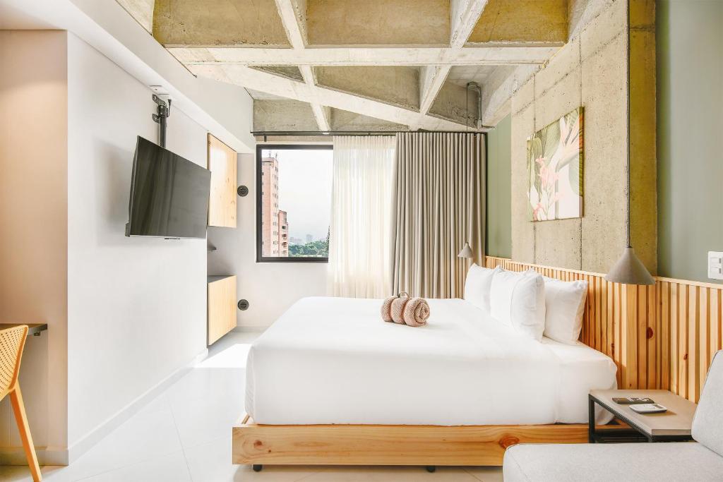 Postel nebo postele na pokoji v ubytování Firenze Lofts