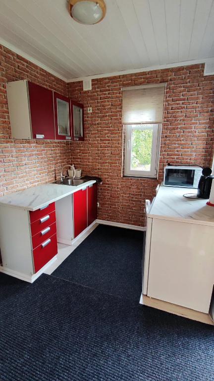 Kuchyň nebo kuchyňský kout v ubytování Villa Freven