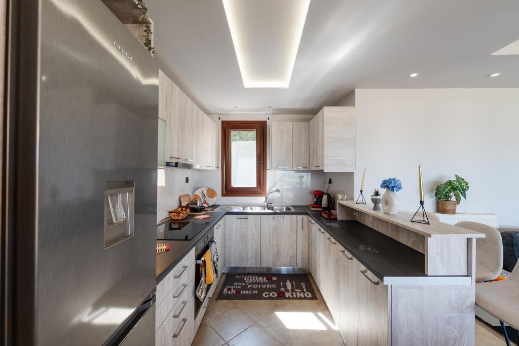 Kuchyň nebo kuchyňský kout v ubytování Notes View Apartments