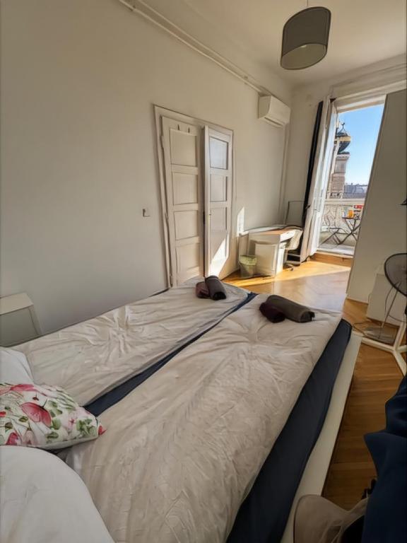Posteľ alebo postele v izbe v ubytovaní Synagogue view residence