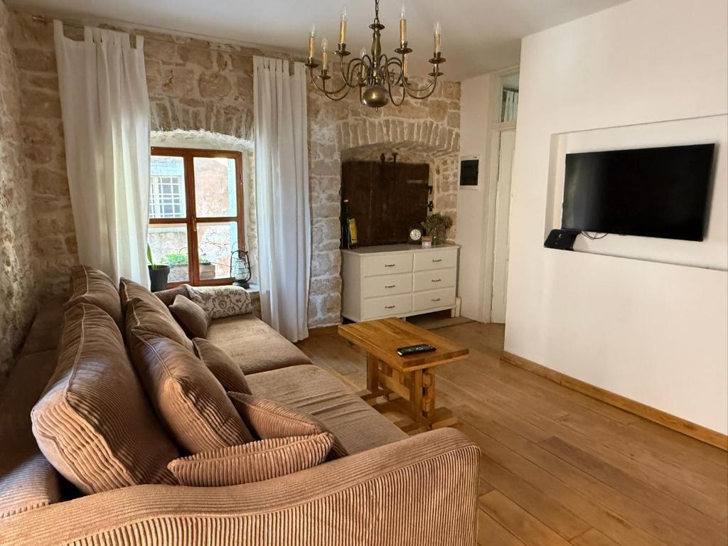 TV a/nebo společenská místnost v ubytování Villa di Piazza