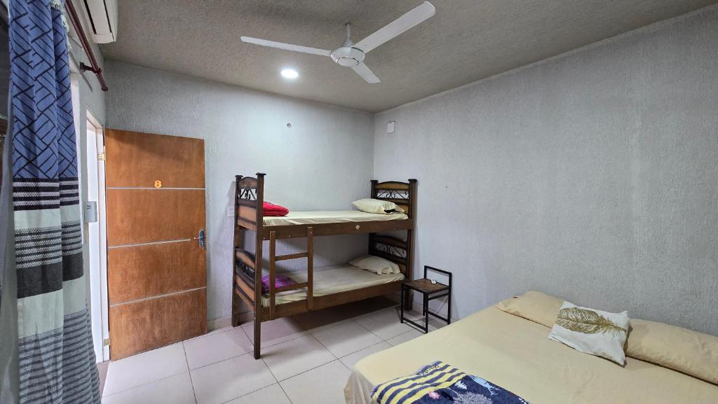 Postel nebo postele na pokoji v ubytování Hostal Fontana Di Luque