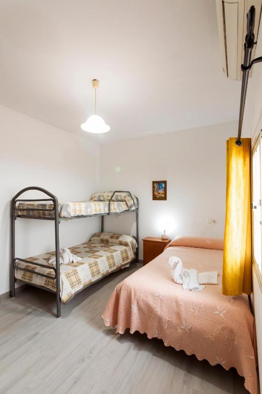 Postel nebo postele na pokoji v ubytování Molino de Lucero, casa rural