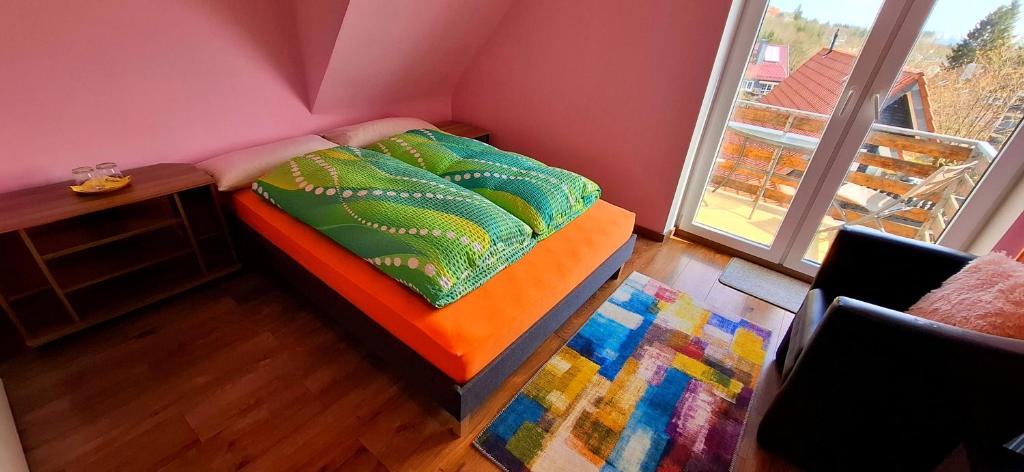 Postel nebo postele na pokoji v ubytování Hotel garni Am Hochwald
