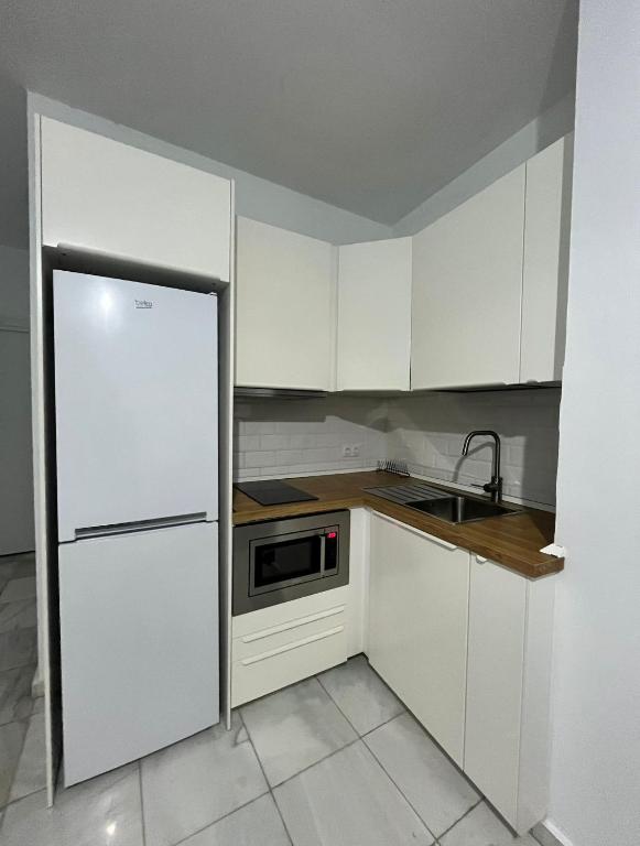 Kuchyňa alebo kuchynka v ubytovaní Premium Mármoles Apartments