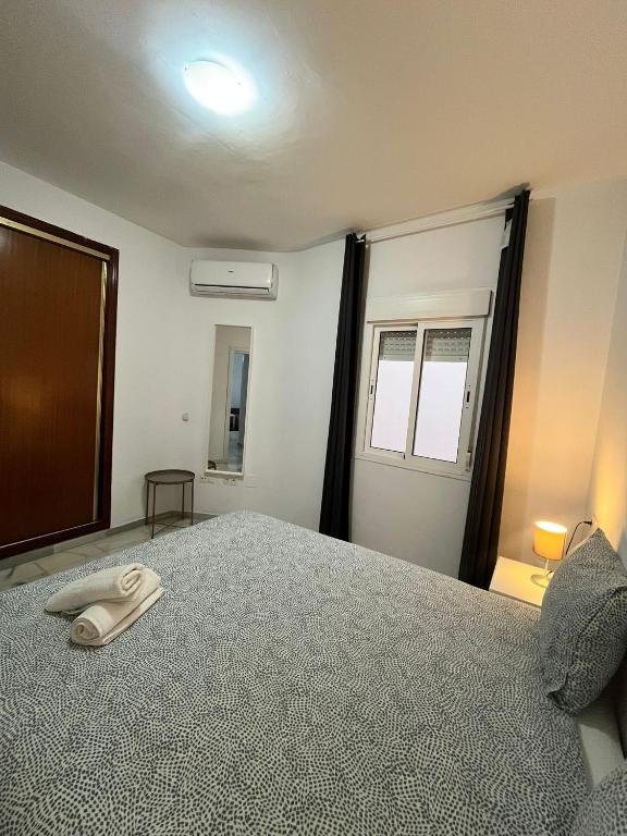 Posteľ alebo postele v izbe v ubytovaní Premium Mármoles Apartments