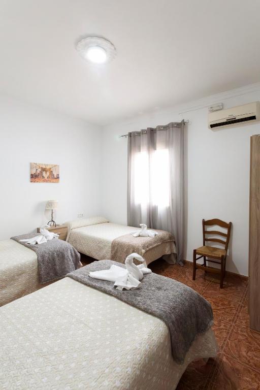 Postel nebo postele na pokoji v ubytování Molino de Lucero, casa rural