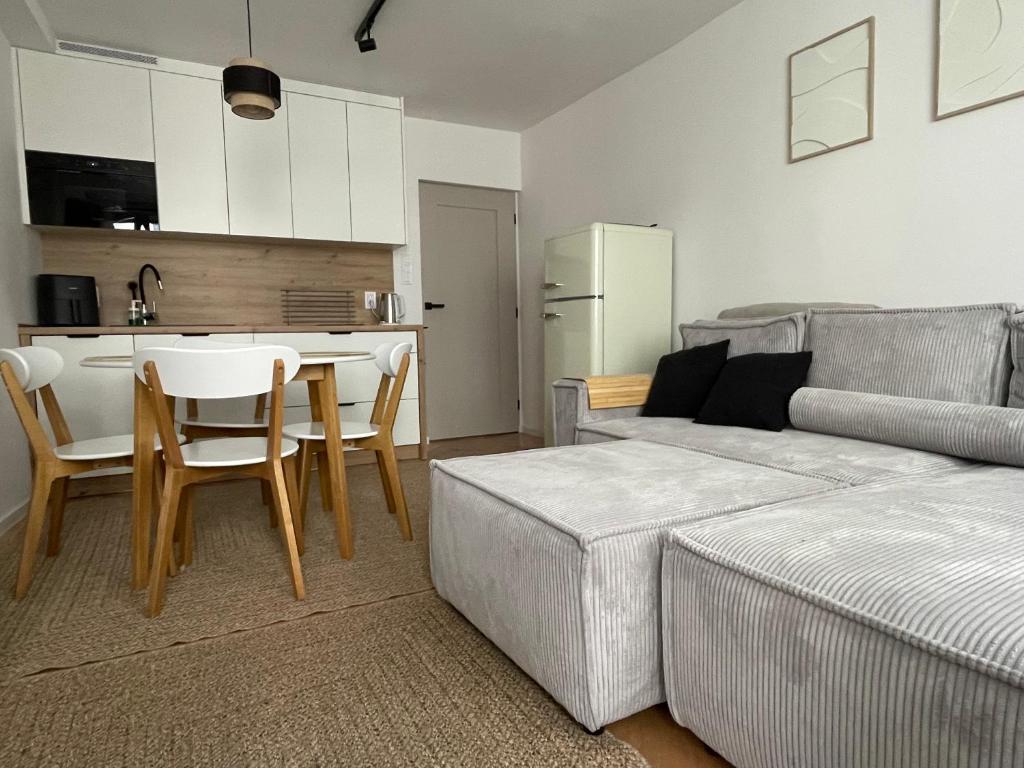 Kuchyň nebo kuchyňský kout v ubytování Klimatyczny apartament w centrum