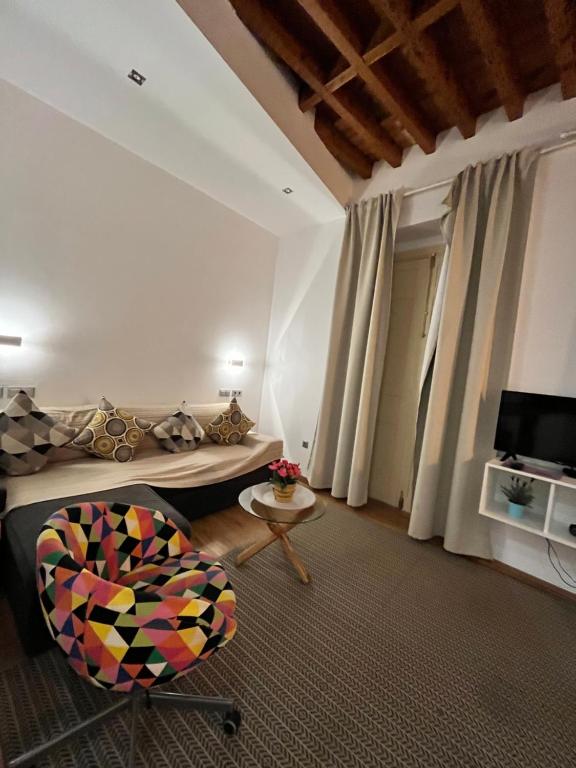 Televízia a/alebo spoločenská miestnosť v ubytovaní Premium Malaga Center