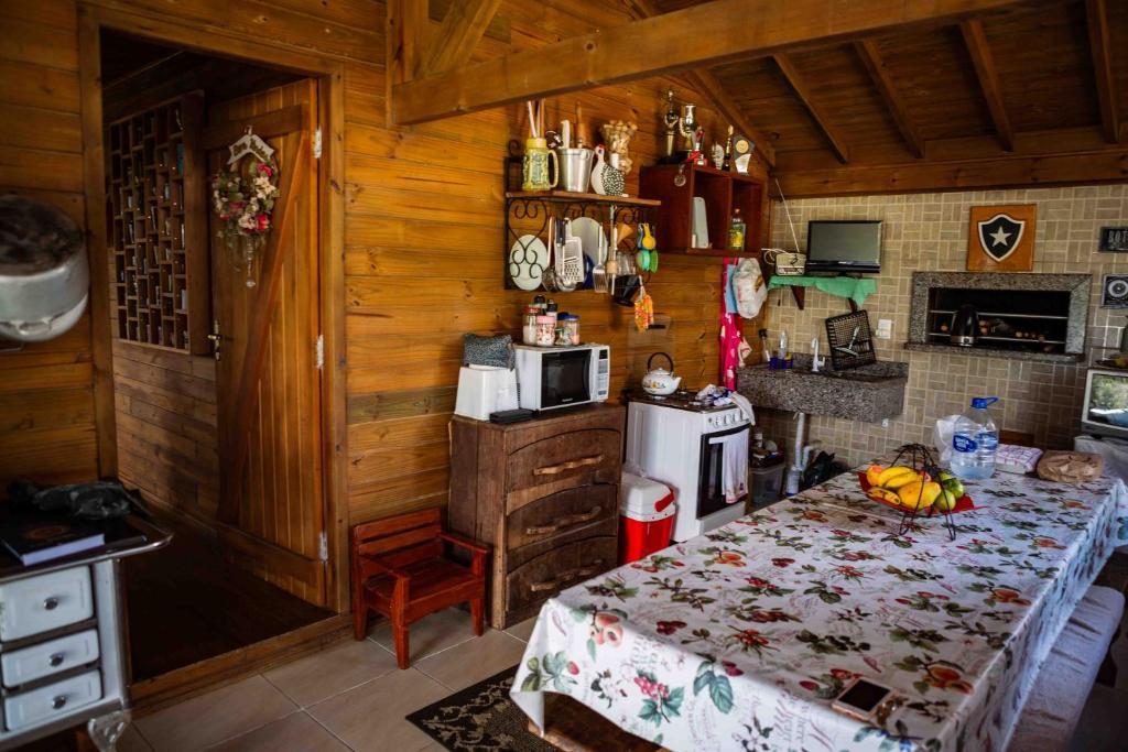Kuchyň nebo kuchyňský kout v ubytování Recanto São Jorge altos da colina