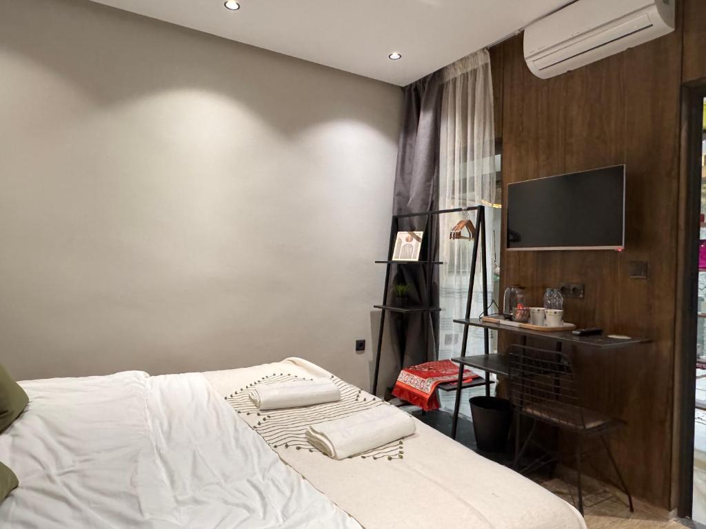 Postel nebo postele na pokoji v ubytování Penthouse-fes