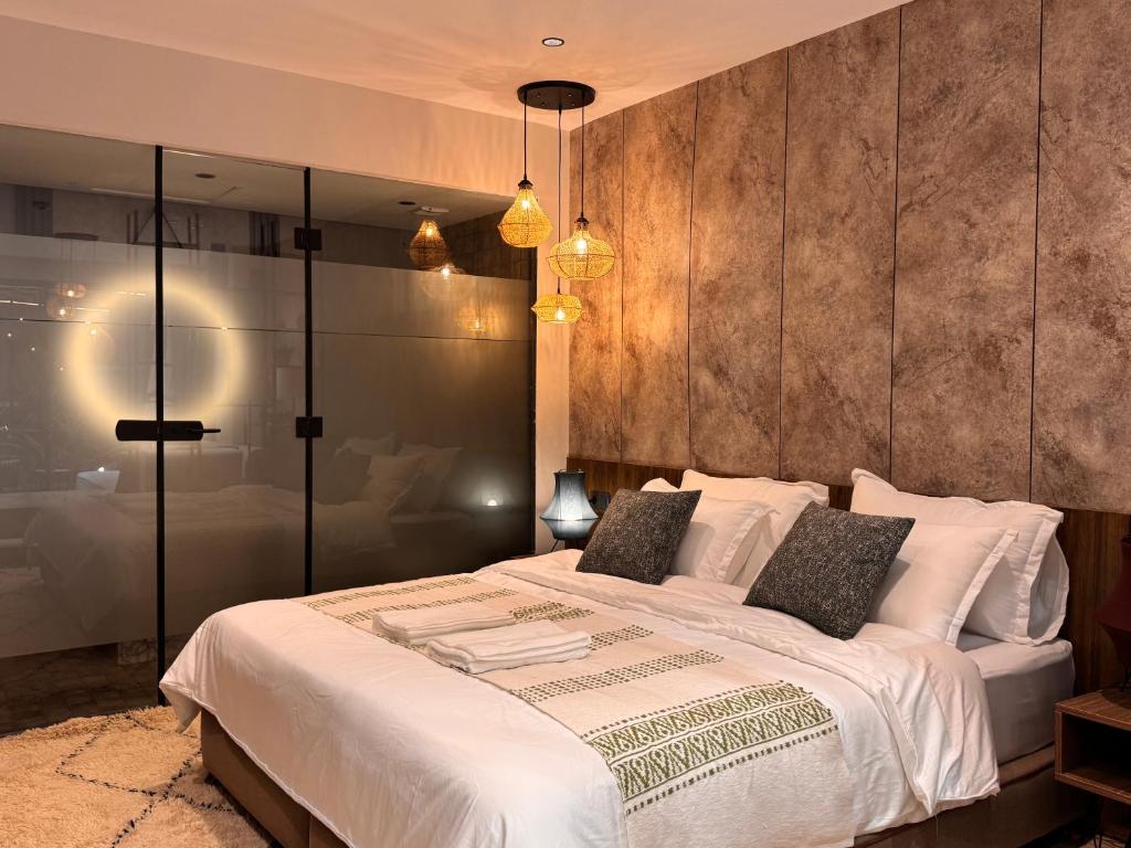 Postel nebo postele na pokoji v ubytování Penthouse-fes