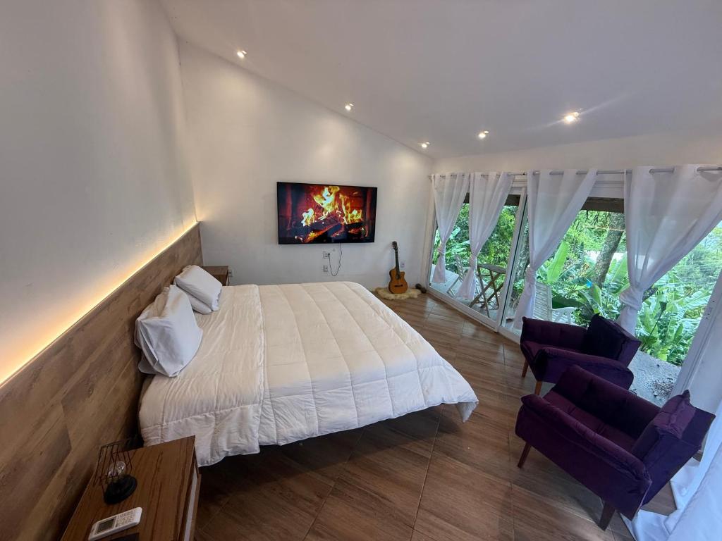 Suíte na montanha - Recreio dos Bandeirantes - entrada independente, com vista pra Floresta