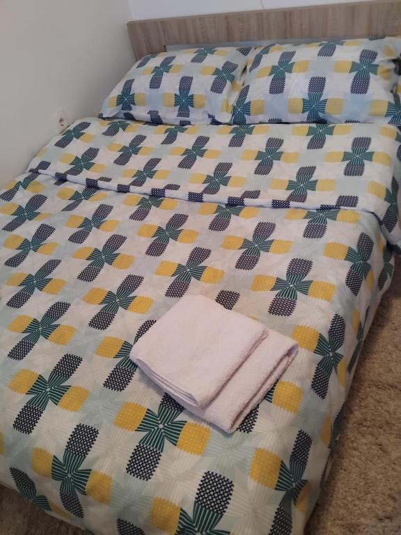 Katil atau katil-katil dalam bilik di Apartman Ðole