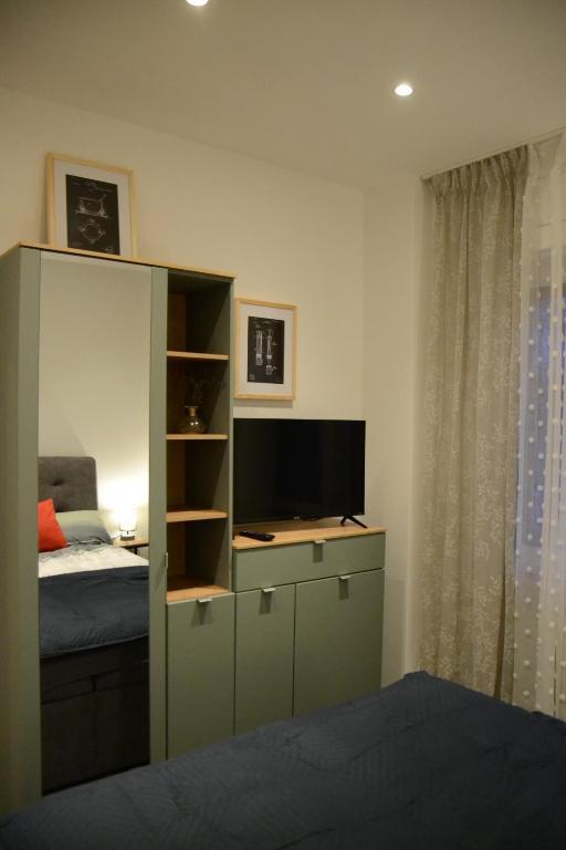 TV a/nebo společenská místnost v ubytování B&B Beyond