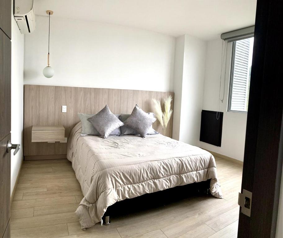 Postel nebo postele na pokoji v ubytování Elegante y comfortable Apartasuite!