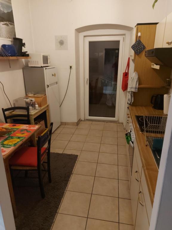 Kuchyň nebo kuchyňský kout v ubytování Narnia Room