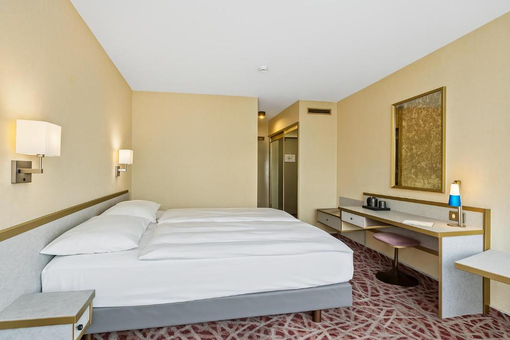 Postel nebo postele na pokoji v ubytování cozy self check-in rooms