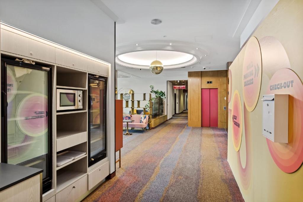 TV a/nebo společenská místnost v ubytování cozy self check-in rooms