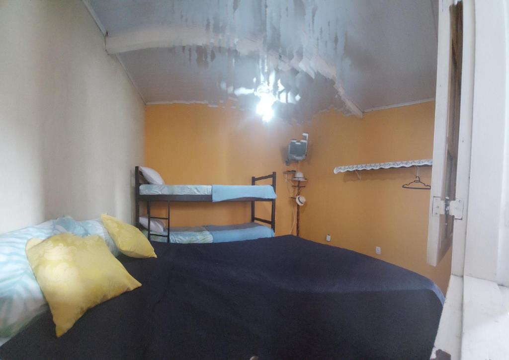 Ένα ή περισσότερα κρεβάτια σε δωμάτιο στο PARAÍSO TOM Do MAR 3