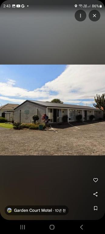 Garden Court Motel & Backpackers - Resim 7