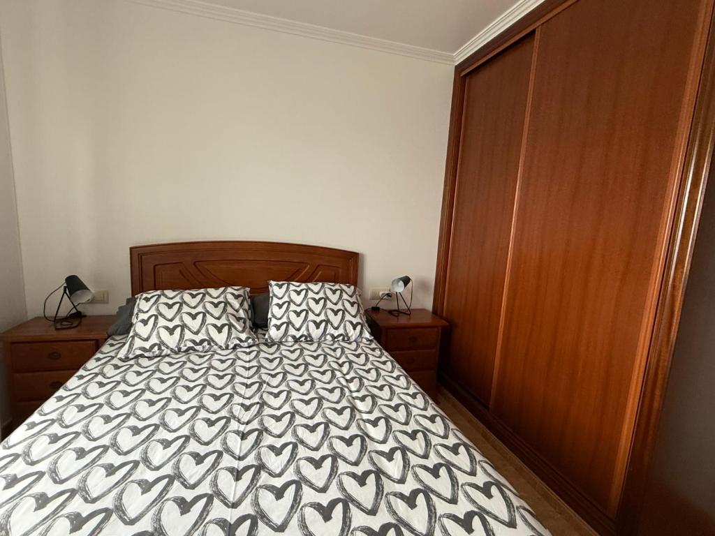 A bed or beds in a room at Piso Vacaciones en el mar