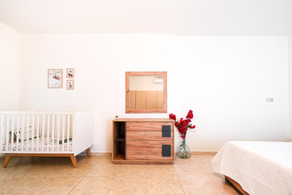 Posteľ alebo postele v izbe v ubytovaní Dafni's house