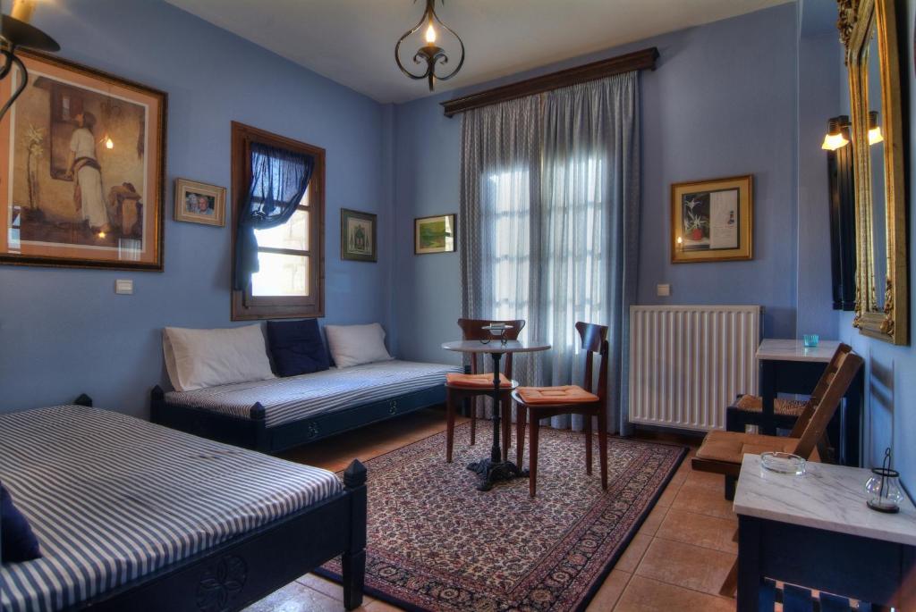 Postel nebo postele na pokoji v ubytování Nefeles