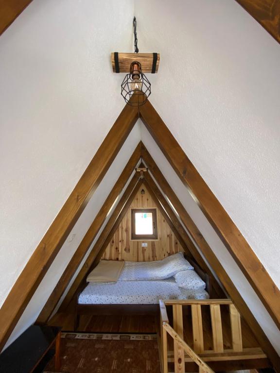 Postel nebo postele na pokoji v ubytování Bungalows Ivan