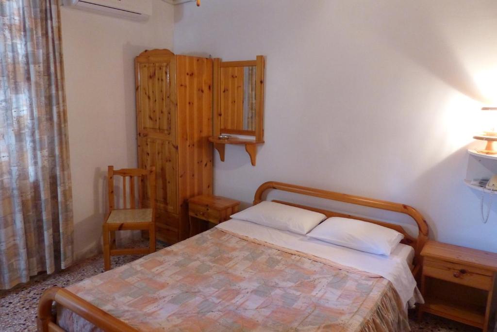 Postel nebo postele na pokoji v ubytování Circe Pansion