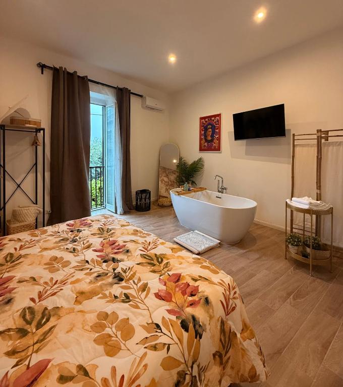 Letto o letti in una camera di Maison Frida • Tivoli