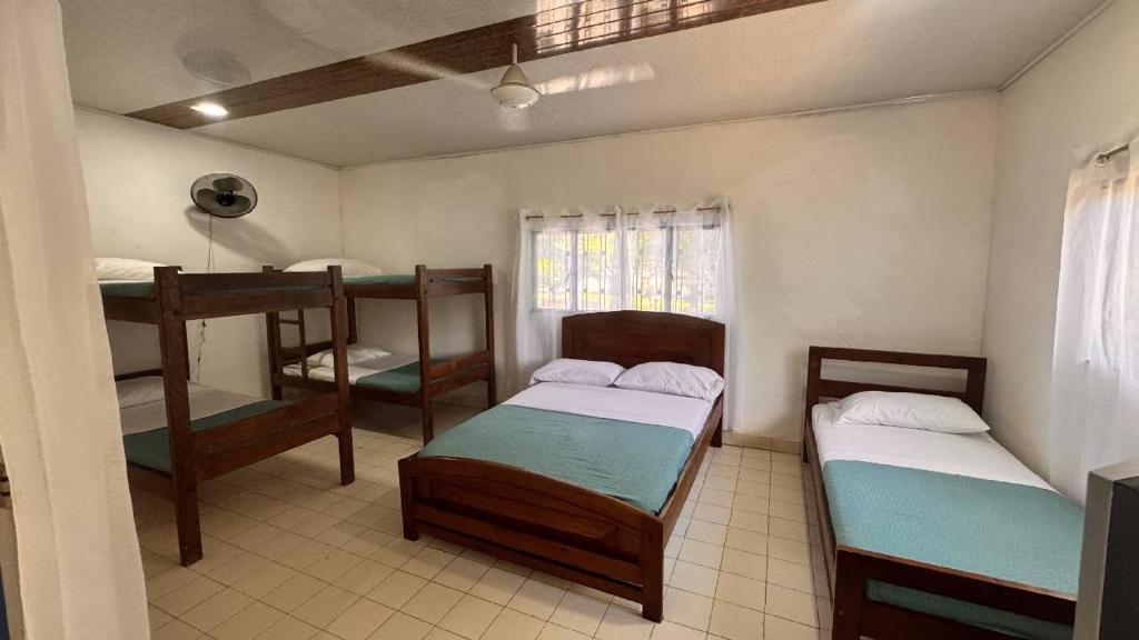 Postel nebo postele na pokoji v ubytování Villa Katherine